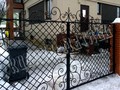 Кованые ворота с узорами в стиле барокко - фото