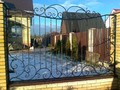 Кованый забор с элементом «волюта» и вальцованными прутками - фото