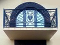 Балкон кованый в классическом стиле с инициалами - фото