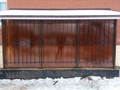 Кованая решетка на окно с витыми элементами и поликарбонатом - фото