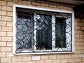 Кованая решетка на окно с растительным орнаментом в стиле Прованс - фото