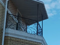 Балкон кованый в стиле Модерн - фото