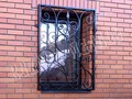 Кованая решетка на окно арт. 6 - фото