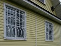 Кованая решетка на окно арт. 13 - фото