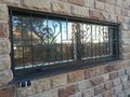 Кованая решетка на окно арт. 22 - фото